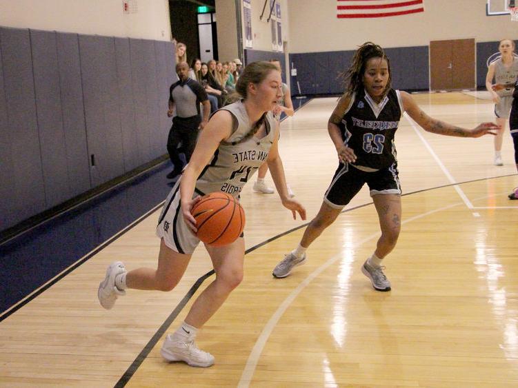 Penn State DuBois sophomore forward Rebecca Martin dribbles and drives with the basketball during a recent home game against Berkeley College at the PAW Center.